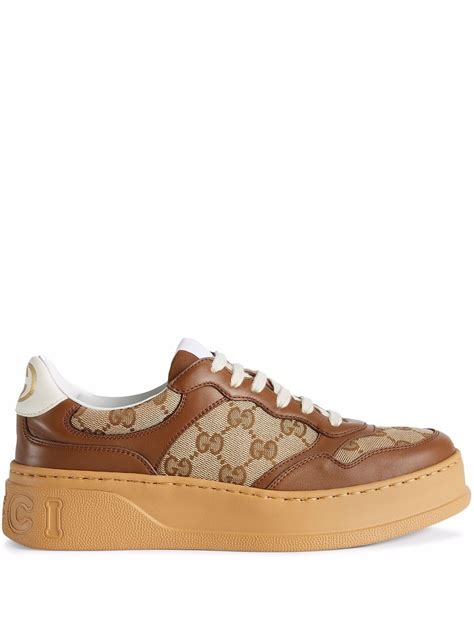 gucci gg imprint trainers|gucci embossed leather low top.